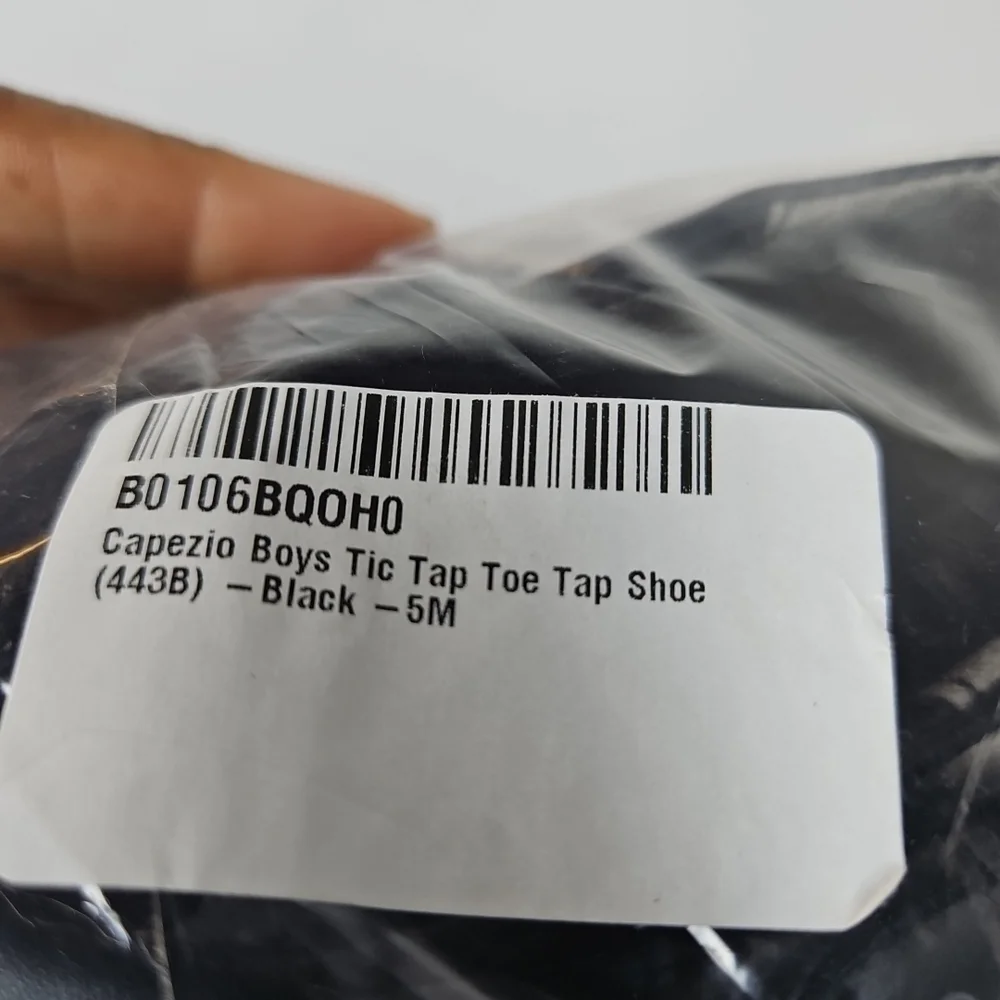 Lace-up tap shoe with a sleekSoft PU leather upper Plastic sole with rubber